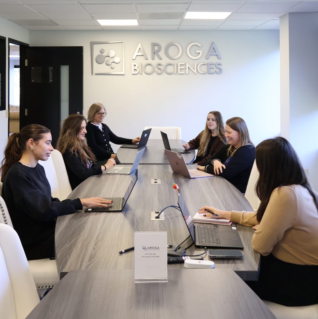 Aroga Biosciences medical writing team working together in the San Diego office